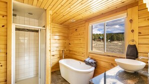 A wooden cabin bathroom with a shower, bathtub, and two sinks. - Mountain House Sleeps 18, Mins to Ski, Hike, Golf, Fish; Generator;  Fenced Yard (Angel Fire)