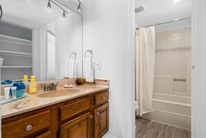 Bathtub, hair dryer, towels