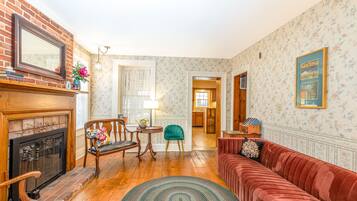 Smart TV, fireplace, books, computer monitors