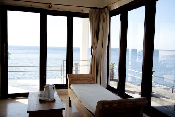 Habitación doble Deluxe, vista al océano | Ropa de cama de alta calidad y decoración personalizada 