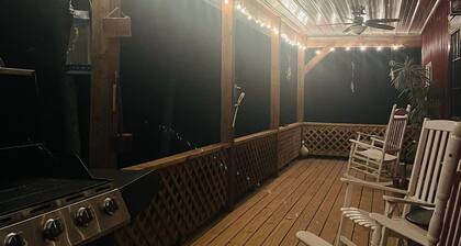 Cozy Cabin nestled on 10 acres just minutes from the lake and the speedway