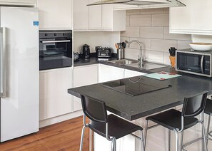 Fridge, oven, stovetop, dishwasher - A superbly appointed large two-storey luxury lodge. (Llangollen)