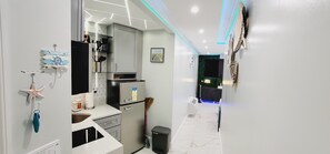 Fridge, microwave, stovetop, coffee/tea maker - Contemporary Beachside Condo (Daytona Beach)