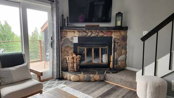 Smart TV, fireplace, table tennis, books