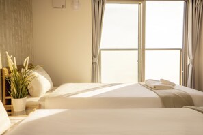 Desk, laptop workspace, free WiFi, bed sheets