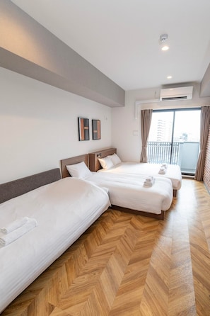 Basic Quadruple Room, 3 Bedrooms, Non Smoking, Bathtub | Individually decorated, individually furnished, desk, laptop workspace - WELLSTAY Osaka Shinimamiya (Osaka)