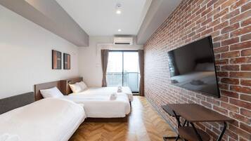 Basic Quadruple Room, 3 Bedrooms, Non Smoking, Bathtub | Individually decorated, individually furnished, desk, laptop workspace