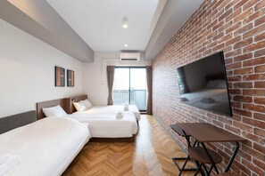 Basic Quadruple Room, 3 Bedrooms, Non Smoking, Bathtub | Individually decorated, individually furnished, desk, laptop workspace