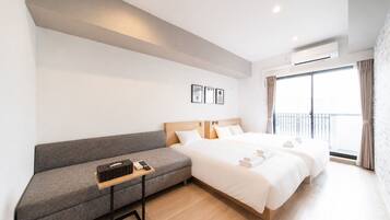 Basic Quadruple Room, 3 Bedrooms, Non Smoking, Bathtub | Individually decorated, individually furnished, desk, laptop workspace