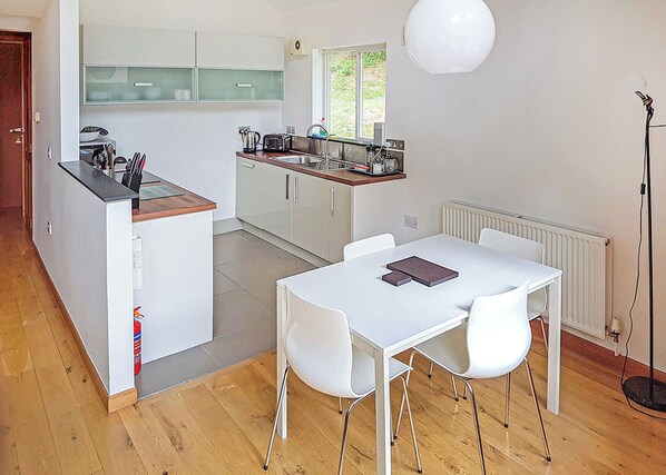 Dining - A superb contemporary one storey luxury lodge with two doubles. (Llangollen)