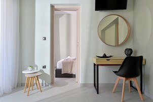 Suite junior, 1 habitación | Ropa de cama de alta calidad y colchones con acolchado adicional