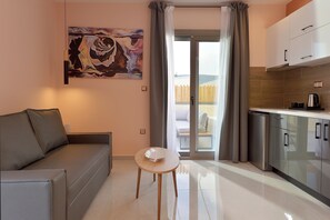 Executive Double Room, 1 Double Bed with Sofa bed, Non Smoking, Ground Floor | Living area | 32-inch LCD TV with digital channels, TV, Netflix - Swan Paradise Residences (Corinth)