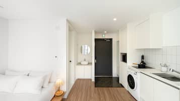 Studio Panorama | Área de sala de estar | Televisión de pantalla plana, Netflix y piso con calefacción