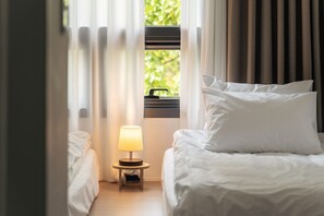 Studio Twin | Cortinas blackout, insonorización, wifi gratis y ropa de cama 