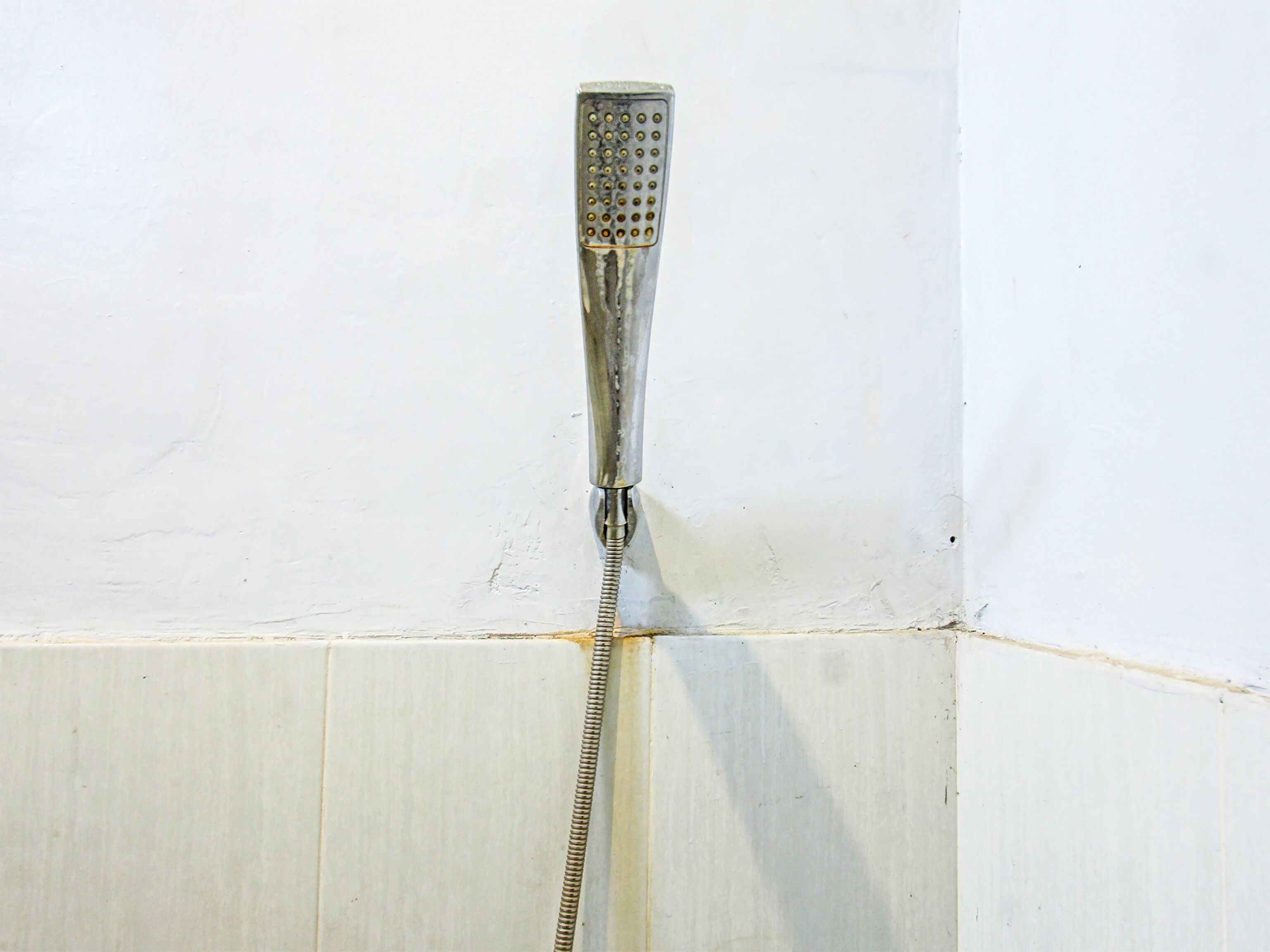 Habitación Deluxe con 2 camas individuales | Baño | Regadera, regadera tipo lluvia, jabón 