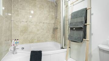 Apartment, 1 King Bed with Sofa bed | Bathroom | Combined shower/bathtub, deep-soaking bathtub, hair dryer, towels