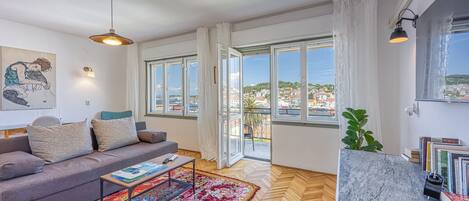 21-inch flat-screen TV with satellite channels, TV