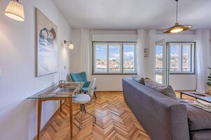 21-inch flat-screen TV with satellite channels, TV