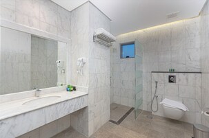 Shower, hydromassage showerhead, designer toiletries, hair dryer