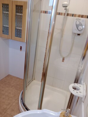 Casa, varias camas | Baño | Tina y regadera independientes, tina profunda, secadora de cabello 