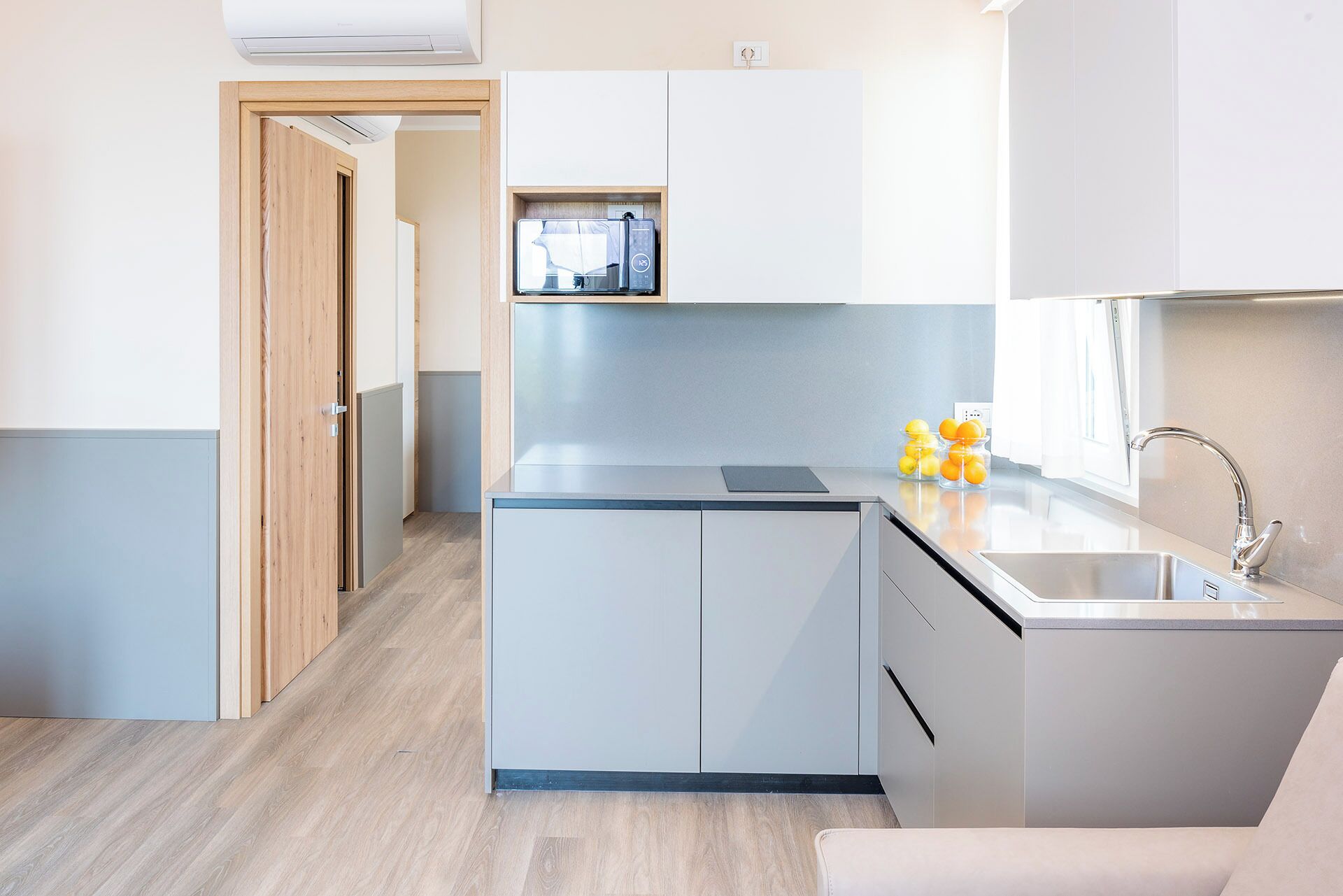 Appartamento, 2 camere da letto, vista lago | Cucina privata | Frigorifero, microonde, piano cottura, pentole/stoviglie/utensili