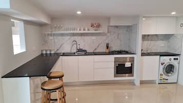 Fridge, oven, electric kettle, toaster