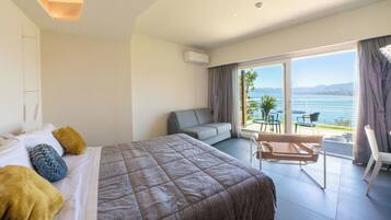 Studiosvit Junior - terrass - havsutsikt | Egyptiska bomullslakan och sängtillbehör av högsta kvalitet