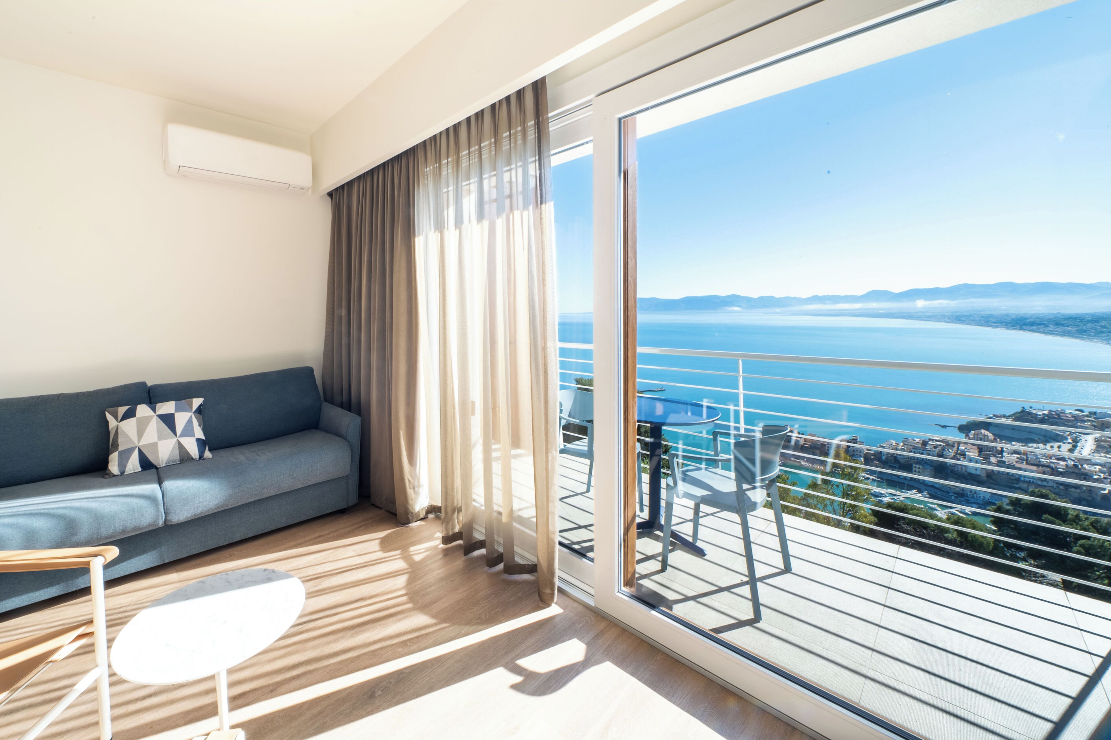 Premium Studio Suite, Balcony, Sea View | Living area | 42-inch flat-screen TV with satellite channels, TV, printers