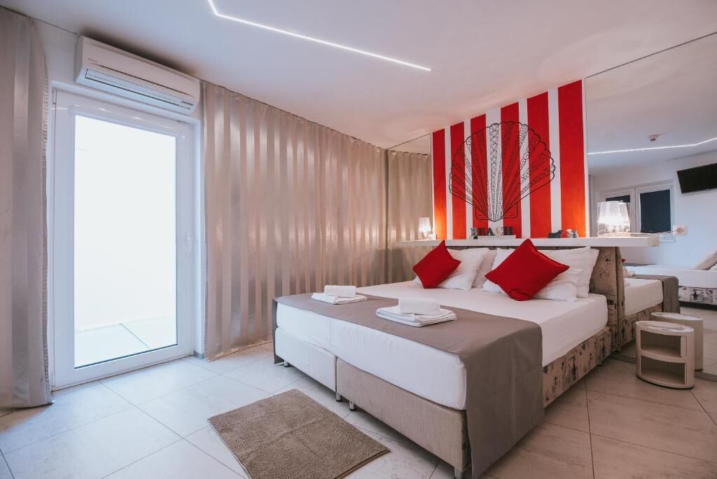 Deluxe-Dreibettzimmer | Allergikerbettwaren, Minibar, Schreibtisch, kostenloses WLAN