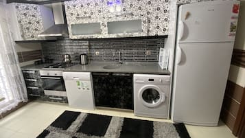 Apartment | Private kitchen | Full-sized fridge, oven, stovetop, dishwasher