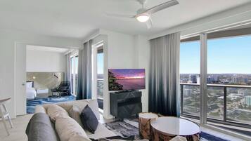 Condo, Multiple Beds, Balcony, Partial Ocean View (Sapphire Suite) | Living area | 42-inch flat-screen TV with digital channels, TV