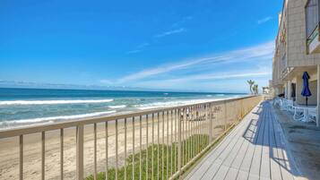 Condo, varias camas, balcón, vista al océano (Seaside Sunset) | Playa | En la playa