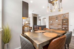 Condo, Multiple Beds, Balcony, Garden View (Time Traveler Suite) | Dining - Time Traveler Suite - Private Balcony (Branson)