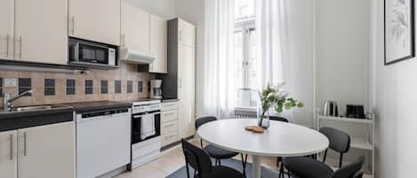 Exclusive Apartment | Private kitchen | Full-size fridge, microwave, oven, stovetop