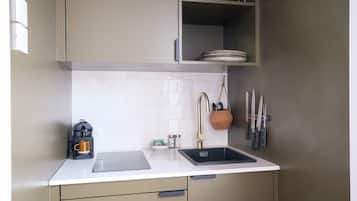 Fridge, microwave, coffee/tea maker, toaster
