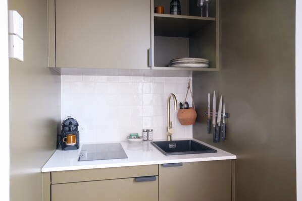 Fridge, microwave, coffee/tea maker, toaster