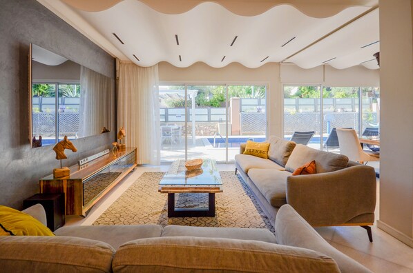 Villa, Private Pool | Living area | 37-inch flat-screen TV with cable channels, TV