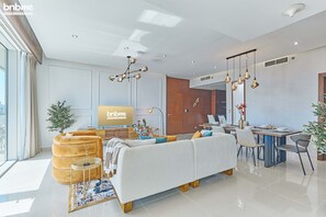 Deluxe Apartment | Living area | Smart TV - bnbme | U Bora Towers | 3 + Maids (Dubai)
