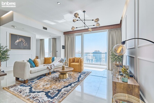 Deluxe Apartment | Living area | Smart TV - bnbme | U Bora Towers | 3 + Maids (Dubai)