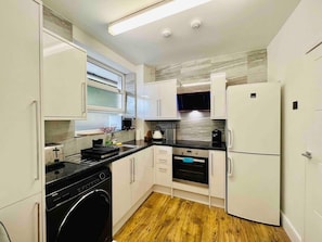 Apartment, Multiple Beds | Private kitchen
