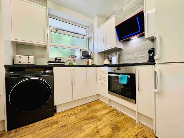 Apartment, Multiple Beds | Private kitchen