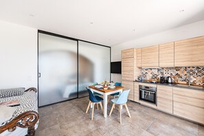 Business Apartment | Private kitchen | Fridge, microwave, oven, stovetop - Castelletto Apts by Wonderful Italy (Polpenazze del Garda)