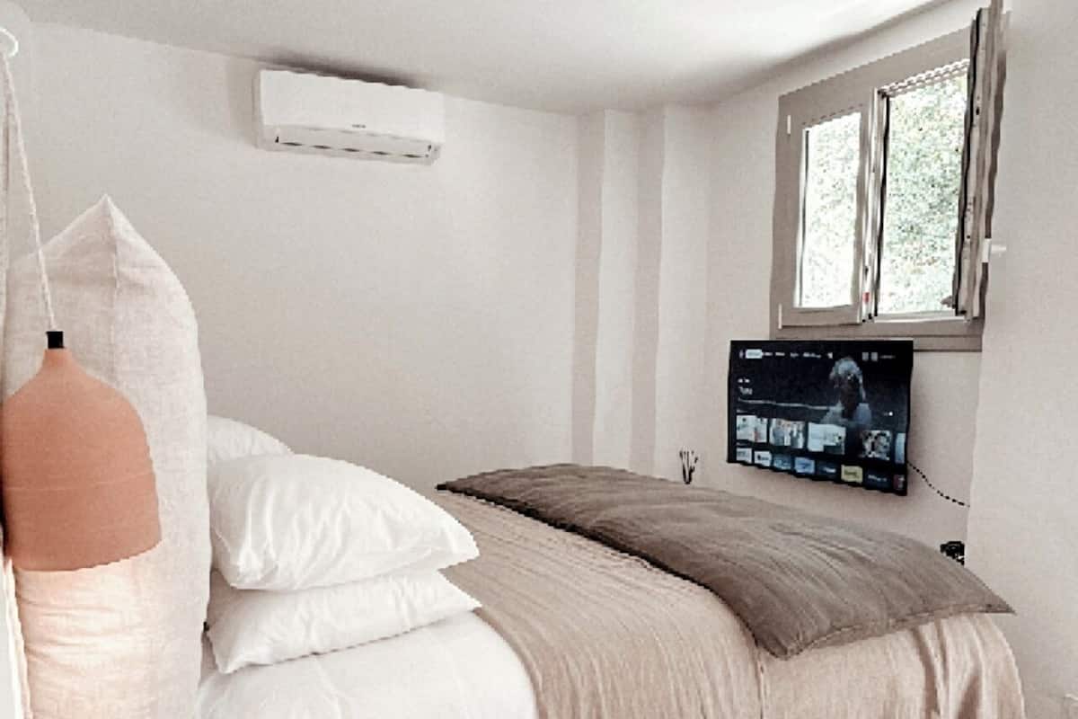 Estudio Deluxe | 1 habitación, camas con pillow-top y caja de seguridad en la habitación
