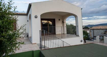 Two-story detached house with terrace, communal pool and parking space