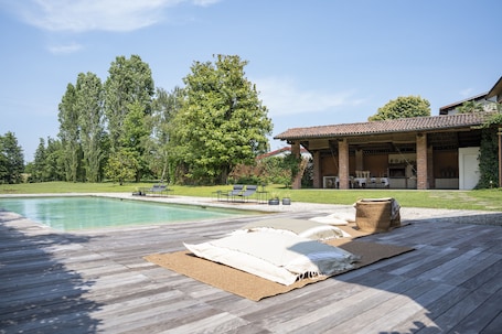 Seasonal outdoor pool, open 8:00 AM to 7:00 PM, sun loungers