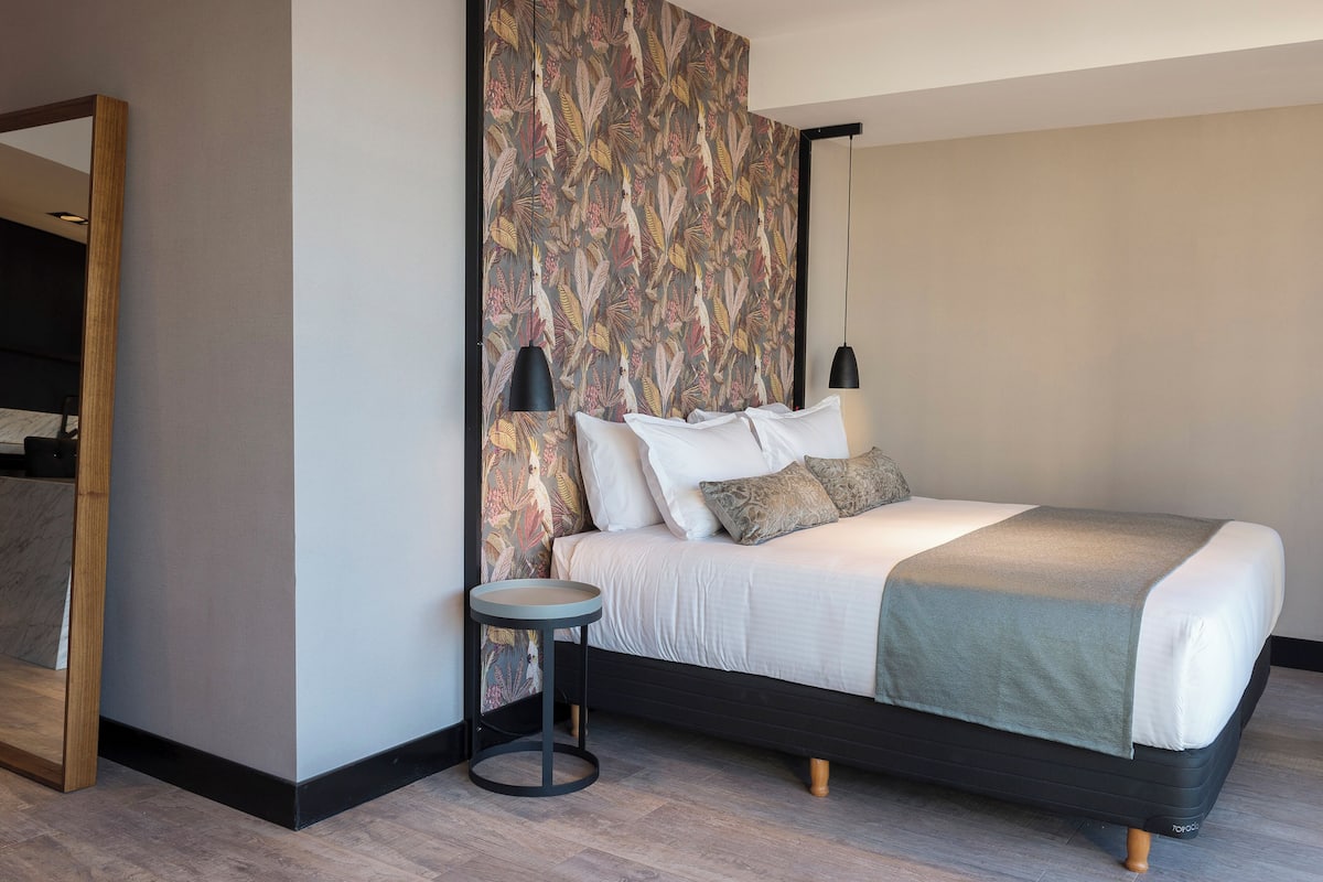 Premium bedding, memory-foam beds, in-room safe, desk