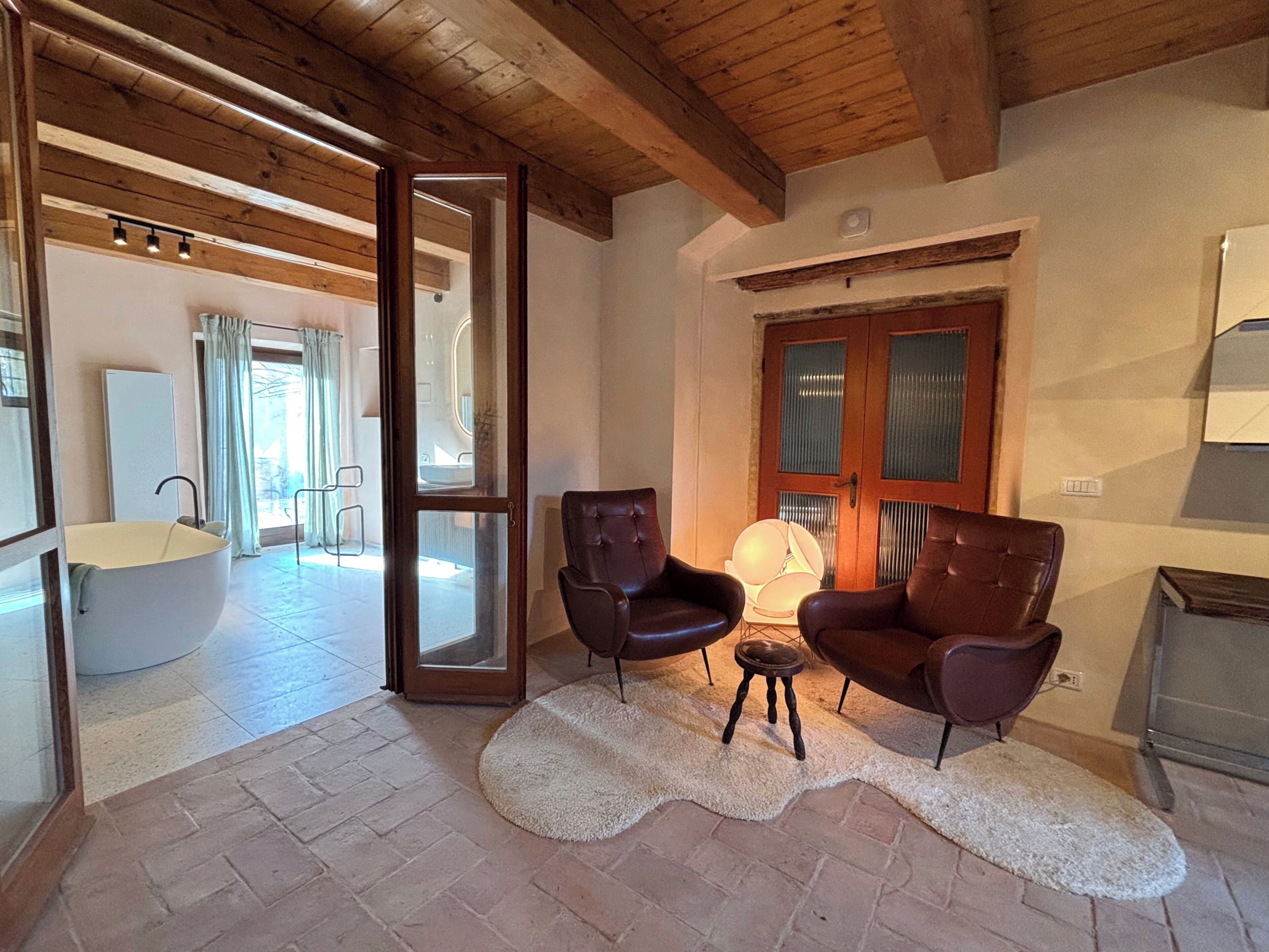 Suite Deluxe, vista vigneti, al piano terra | Area soggiorno