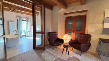 Suite Deluxe, vista vigneti, al piano terra | Area soggiorno