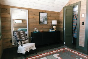 Primary bedroom sitting area and wardrobe - Four-Season Luxury Lakefront Cabin Close to Camden and Rockland (Hope)
