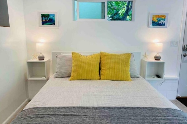 Comfortable queen size bed with new mattress.